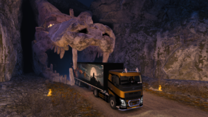 TRruck in skull like entry to tunnel